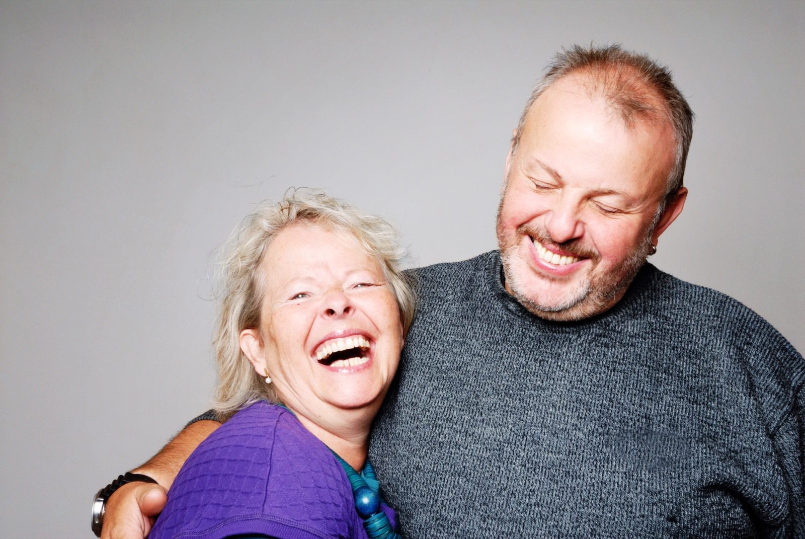 Middle aged couple laughing