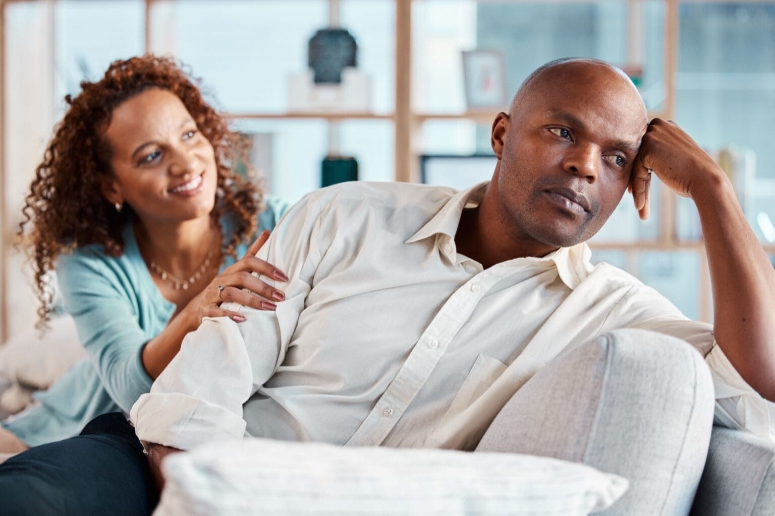 Couple sitting on couch